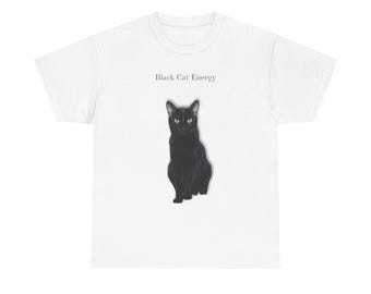 Black Cat Energy Unisex Heavy Cotton Tee -I Don’t Chase I Become