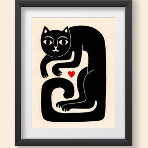 May include: A framed print featuring a stylized black cat illustration on a cream background. The cat is depicted in a seated, curved posture with its long tail wrapped around its base. A small, solid red heart is positioned near the cat's chest.