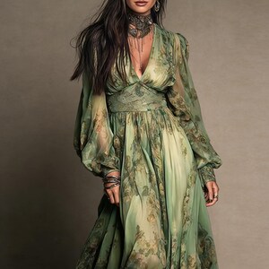 May include: A flowing, light green dress with a floral pattern. The dress features long, billowy sleeves and a deep V-neckline. The fabric appears sheer and lightweight, with a cinched waist and a full skirt. The dress is a soft, muted green with a subtle floral print.