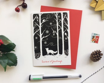 Winter Fox Illustrated Christmas Card Black, White and Red silhouette with Robins, Lanterns, Swirling Snow and Snowflakes Season's Greetings