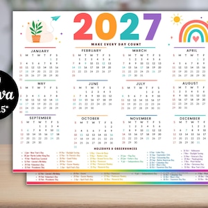 May include: A 2027 wall calendar measuring 11 inches by 8.5 inches, featuring a colorful design with a rainbow, a potted plant, and the text 'MAKE EVERY DAY COUNT'. It displays all twelve months with dates, days of the week, and holidays listed below.