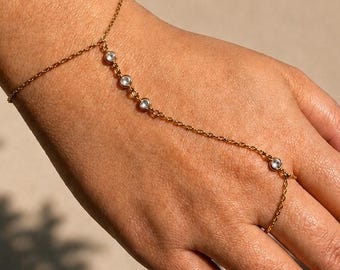 Cadena de mano bañada en oro de 18 quilates con cristales