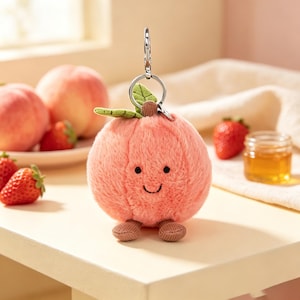 Jellycat adorable peach plush keychain, cute peach plush pendant. Suitable for backpacks, girls, teenagers, and great gift choice for friend