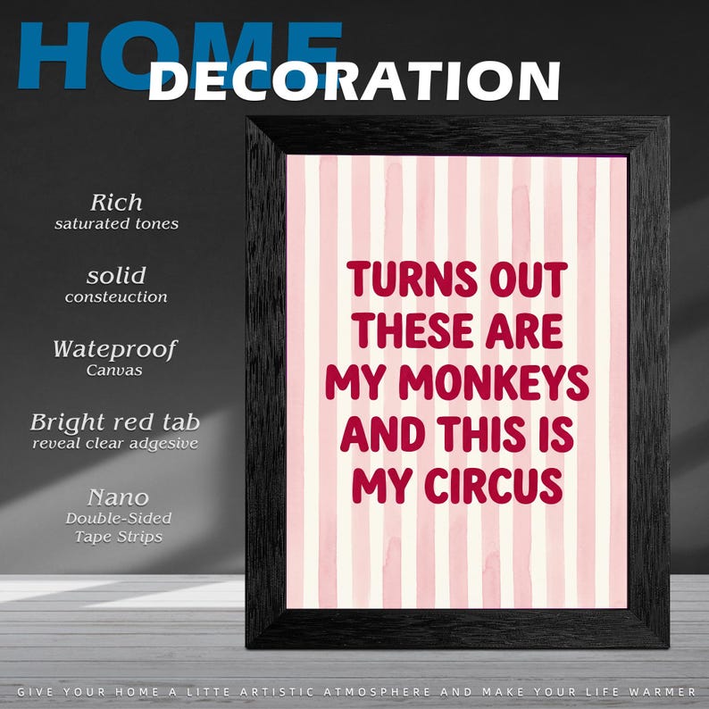 May include: A framed wall art print with a black frame. The print has a pink and white striped background with the text "TURNS OUT THESE ARE MY MONKEYS AND THIS IS MY CIRCUS" in red. The image is for home decoration.