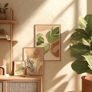 May include: A warm-toned interior scene featuring a wooden shelf with decorative items, including framed botanical prints, vases, and a potted plant. A large fiddle-leaf fig in a terracotta pot stands nearby. The room is bathed in natural light.