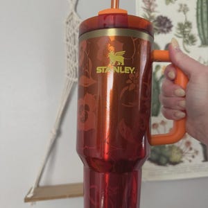 May include: A set of three ceramic mugs with a speckled, matte finish. The mugs are in shades of cream, light gray, and dark gray. Each mug has a simple, minimalist design, perfect for coffee or tea.