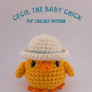 May include: A crocheted yellow chick wearing a cream-colored hat with a light green band. The chick has black eyes and an orange beak and feet. Text above the chick reads "CECIL THE BABY CHICK PDF CROCHET PATTERN."