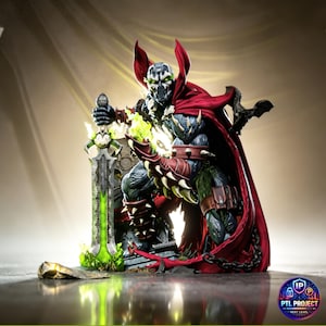 May include: A detailed figurine of a comic book character, kneeling with a large sword. The figure is clad in dark armor, a red cape, and has a skull-like face. The sword glows green, and the base has a gold emblem.