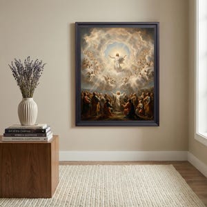 May include: A framed religious painting depicting a scene of ascension with a central figure surrounded by clouds and angels, positioned above a stack of books and a white vase filled with dried lavender on a wooden pedestal.