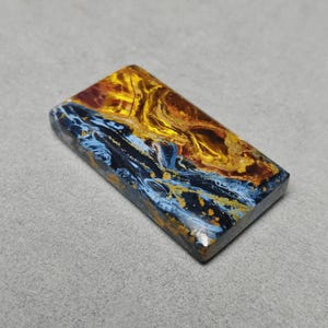 Cabujón de pietersita natural, piedra de tormenta rectangular.