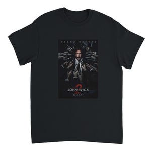 May include: Black t-shirt with a movie poster for "John Wick 2" starring Keanu Reeves. The poster depicts Reeves with guns pointed at him. The film's title and release date are displayed on the shirt.