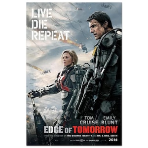 May include: Movie poster for "Edge of Tomorrow" featuring Tom Cruise and Emily Blunt. The title "LIVE DIE REPEAT" is at the top. The movie title is in large red letters. The poster includes the year 2014 and the director's name.