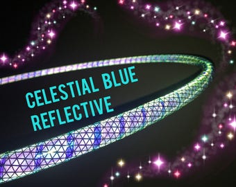 May include: A blue and purple reflective hoop with a celestial design. The text "CELESTIAL BLUE REFLECTIVE" is written on the hoop.