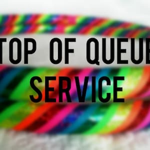 May include: Image features two colorful hula hoops with a rainbow pattern. The text "TOP OF QUEUE SERVICE" is overlaid in black. The hoops are a vibrant mix of colors, including red, orange, yellow, green, blue, and purple.