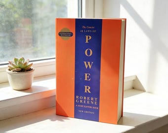 The Concise 48 Laws of Power Paperback | Robert Greene Strategy Book (English Edition)