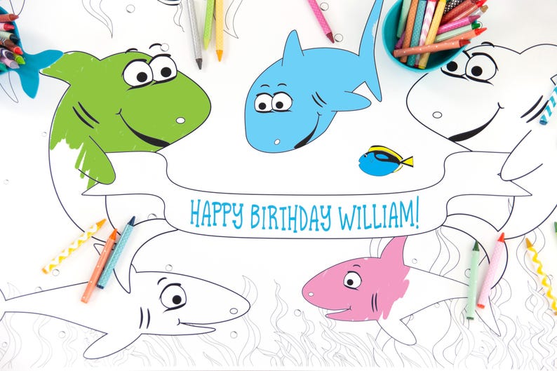May include: A coloring page featuring a banner that says "Happy Birthday William!" with four sharks and a small fish. The sharks are outlined and ready to be colored in. The sharks are green, blue, pink, and white. The fish is blue.