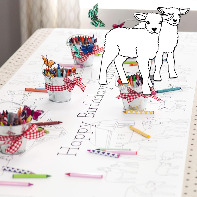 My personalized farm themed coloring tablecloth features horses, cows, pigs, sheep, chickens, ducks, and various barns and tractors. It's staged here with mini tin milk buckets filled with crayons and adorned with red and white gingham ribbons.