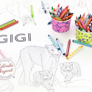 May include: A coloring page with a jungle theme featuring a variety of animals, including a lion, a tiger, and a zebra. The page is surrounded by colorful crayons in two cups. The text "Happy Gigi" is written at the top of the page.