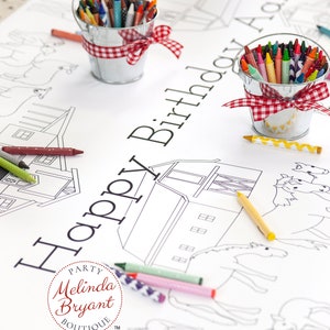 This table length view of my farm coloring table runner features horses, pigs, sheep, and a barn. The illustrated scene runs the length of the runner on both sides of the table. It is staged with miniature milk buckets filled with crayons.