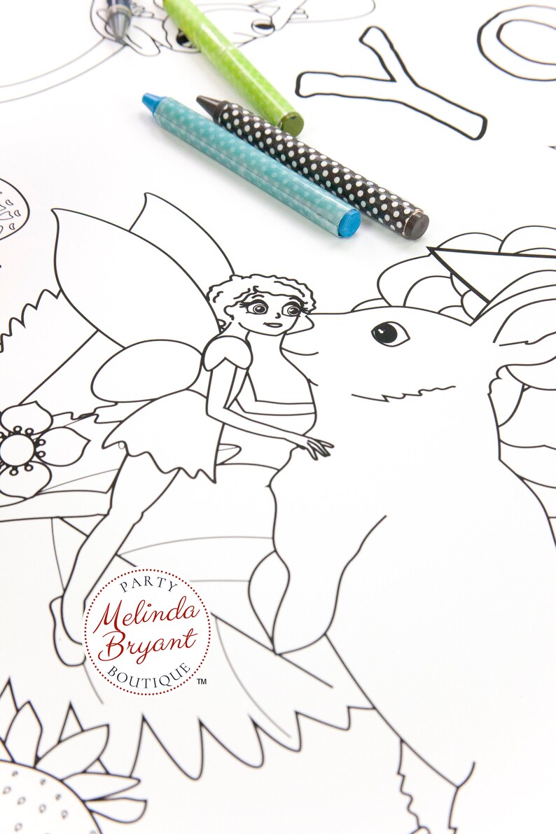This is a close-up detail of a line drawing of a garden fairy nuzzling a curious bunny. The fairy is about 5" tall, shown with crayons for scale. One small part of this table length coloring page featuring  fairies and animals in a garden.