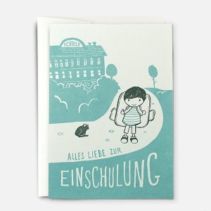 May include: A green and white illustrated card with a child carrying a backpack walking towards a school building. The text on the card reads "Alles Liebe zur Einschulung".