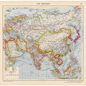 May include: A vintage political map of Asia titled ASIE POLITIQUE, featuring detailed borders, coastlines, and geographical labels in French. The map uses colour-coded regions to denote territories, with a legend in the bottom left corner.