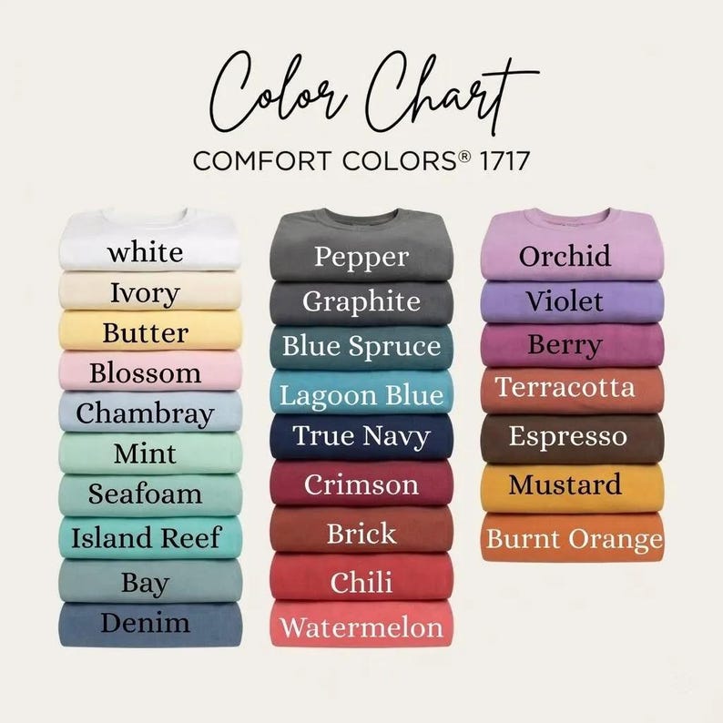 Op de afbeelding: Een kleurenkaart toont stapels gevouwen Comfort Colors 1717 shirts in verschillende kleuren. De kaart bevat tinten als wit, ivoor, boter, blossom, chambray, mint, seafoam, island reef, bay en denim.