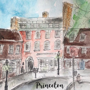 May include: Watercolor painting of a street scene in Princeton, New Jersey. The painting features several brick buildings with windows and doors, a street lamp, and a sign that says "Princeton".