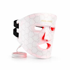 May include: A white LED face mask with a honeycomb pattern and the word "ANLUMO" in gold. The mask has eye and mouth openings, with red lights illuminating the inside. It features black adjustable straps and a white cord.
