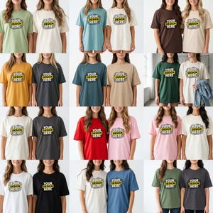 May include: A collection of short-sleeved crew neck t-shirts in various solid colors including sage green, cream, brown, mustard yellow, charcoal, blue, tan, dark green, red, pink, and black, each featuring the text YOUR DESIGN HERE in the center.