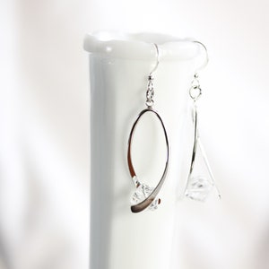 Ribbon twist dangle earrings, silver plated brass, crystal