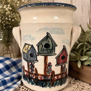 Hand-painted ceramic crock with birdhouse design by Marshall Pottery.