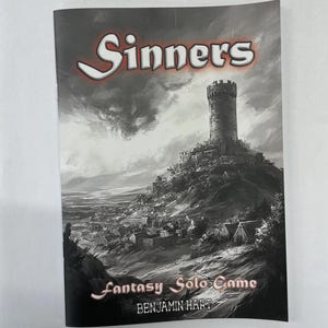 May include: A black and white fantasy solo game book titled "Sinners." The cover art shows a medieval castle on a hill with a dark, cloudy sky. The author's name, Benjamin Hart, is also visible.