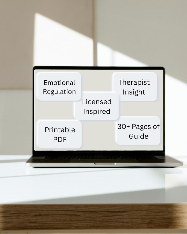 Peut inclure: Un ordinateur portable affiche un guide num&eacute;rique avec le texte "Emotional Regulation", "Therapist Insight", "Printable PDF", "30+ Pages of Guide" et "Licensed Inspired". L'ordinateur portable est ouvert sur une surface blanche.