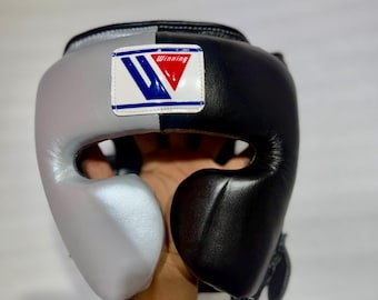 Bleiben Sie geschützt. Bleib Siegering. Boxen Power Kopfschmuck