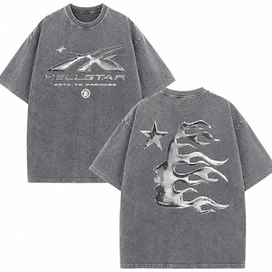 May include: Gray t-shirt with a metallic silver design. The front features the text "HELLSTAR" and a logo. The back displays a star and a face engulfed in flames. The shirt has a vintage, washed look.
