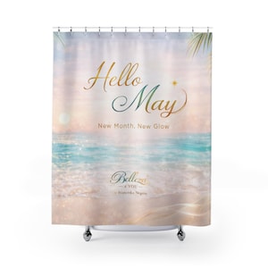 May include: A white ceramic mug with a black handle and the text "But First, Coffee" in a bold, black font. The mug is set against a blurred background, suggesting a cosy setting.