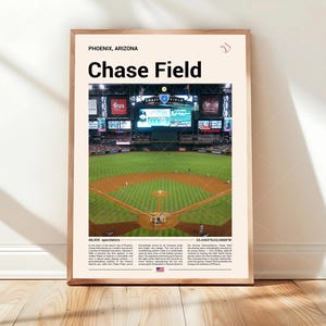 May include: A framed print of Chase Field in Phoenix, Arizona. The image shows the baseball field with the text "Chase Field" in large, bold letters. The print includes details about the stadium and its location.