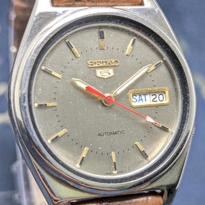 Rare vintage Seiko 5 automatic day date movement number 7s26A japan made men's watch