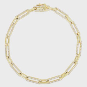 May include: A gold-colored link bracelet with a rectangular clasp. The bracelet is adorned with small, sparkling stones set along the links. The design is symmetrical and elegant, suitable for formal or everyday wear.
