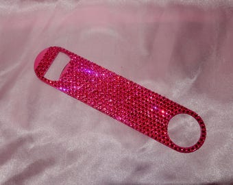 Różowy, olśniewający otwieracz do butelek