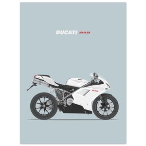 May include: A digital illustration of a white Ducati 848 sport motorcycle on a light gray background. The motorcycle features black wheels, a black lower fairing, and the text DUCATI 848 printed in white and red above the motorcycle profile.