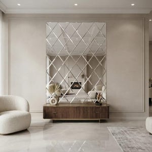 May include: A large rectangular wall mirror featuring a decorative diamond-shaped grid pattern across its surface. The mirror is positioned directly above a dark brown wooden console table with a slatted front design and multiple storage drawers.