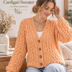 May include: An orange V-neck cardigan sweater with a cable knit texture and four dark brown buttons. The text Swirling Winter Cardigan Sweater crochet pattern is visible at the top of the image, accompanied by a small decorative leaf graphic.