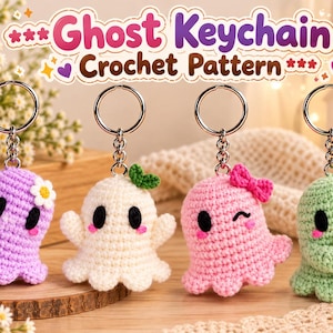 May include: Four crocheted ghost keychains with metal rings. The ghosts are lavender with a white flower, cream with a green leaf, pink with a bow, and light green holding a sunflower. The text reads Ghost Keychain Crochet Pattern.