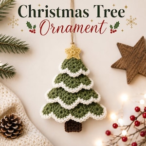 May include: A crocheted Christmas tree ornament featuring a dark green tree with white scalloped edges, a brown trunk, and a small yellow star at the top. The text "Christmas Tree Ornament" is displayed above the hanging decoration.