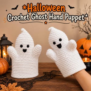 May include: Two white crochet ghost hand puppets with black stitched eyes and mouths. The text above reads *Halloween Crochet Ghost Hand Puppet*. The puppets feature a rounded head, two small arms, and a cylindrical body for hand insertion.