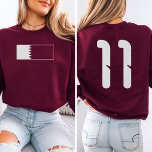 Camiseta unisex con estampado inspirado en el fútbol del número 11 de Qatar, homenaje a Estados Unidos en la Copa Mundial de Fútbol 2026, diseño casual de jugador con estampado a doble cara al estilo qatarí. imagen 8