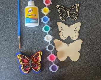 May include: A craft kit containing a blue paintbrush, a 40ml bottle of PVA glue, a strip of eight small paint pots in various colors, two plain wooden butterfly cutouts, one laser-cut wooden butterfly, and one finished butterfly craft.
