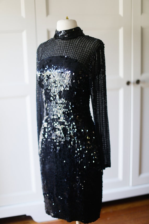 black fitted sequin dress